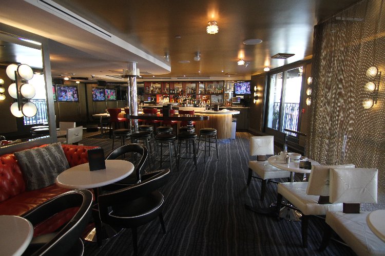Modern Sophisticated Bar and Sitting Lounge Area: PLEASE NOTE: rates stated are for crews larger than 10 people. Small crew (up to 5 people) = $500 per hour; 5-10 people crew = $1000 per hour. For large crews - price is negotiable. Availability depends on day and time requested. 9PM is the limit for shooting times. Parking is available - $42 per space for 24 hours.